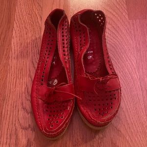 Red leather flats